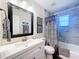 Bathroom featuring vanity with sink and a shower with tub at 2004 Nobleton Ave, Spring Hill, FL 34608
