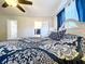 Inviting main bedroom with stylish furnishings and en-suite bathroom at 2004 Nobleton Ave, Spring Hill, FL 34608