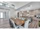 Bright, open kitchen with stainless steel appliances, large island, and stylish light fixtures is perfect for entertaining at 2140 Catalina Dr, Clearwater, FL 33764