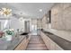 Modern kitchen featuring sleek cabinetry, stainless steel appliances, and a large island with bar seating at 2140 Catalina Dr, Clearwater, FL 33764