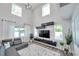 Bright and airy living room with high ceilings, modern furnishings, and plenty of natural light at 2140 Catalina Dr, Clearwater, FL 33764