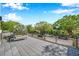 Enjoy the view from this rooftop deck with black metal railing, offering an outdoor seating area and neighborhood views at 2140 Catalina Dr, Clearwater, FL 33764