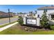 Welcoming 'Willow Reserve' community sign with decorative stone pillars and lush landscaping, setting a charming tone at 23231 Scaglione Dr, Lutz, FL 33549