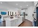 Spacious modern kitchen with a large island, stainless appliances, and an open concept design at 23231 Scaglione Dr, Lutz, FL 33549