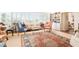 Elegant living room with a bright window, accentuated by refined decor and built-in bookshelves at 2401 S Ardson Pl # 503, Tampa, FL 33629