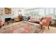 Cozy living room with a classic fireplace, complemented by elegant decor and natural light at 2401 S Ardson Pl # 503, Tampa, FL 33629