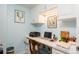 This office boasts built-in cabinets, drawers, a spacious countertop and stylish decor at 2401 S Ardson Pl # 503, Tampa, FL 33629