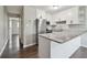 Modern kitchen with stainless steel appliances and granite countertops, open layout great for cooking at 2500 Harn Blvd # B11, Clearwater, FL 33764
