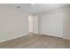 This bright bedroom features new flooring and a closet, offering ample space and storage at 2692 Royal Ridge Dr, Spring Hill, FL 34606
