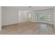 Bright living space with wood flooring and a bay window at 2692 Royal Ridge Dr, Spring Hill, FL 34606