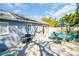 Outdoor patio with grill and furniture, perfect for enjoying the sunny weather at 2700 56Th S St, Gulfport, FL 33707