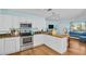 Modern kitchen with stainless steel appliances, granite countertops, and ample cabinet space for all your culinary needs at 2700 56Th S St, Gulfport, FL 33707