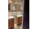 Bathroom features dual sinks, tile flooring, and vanity with ample storage at 3005 W 18Th W Ave, Bradenton, FL 34205
