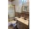 Functional bathroom with enclosed shower, tiled walls and modern sink at 3005 W 18Th W Ave, Bradenton, FL 34205
