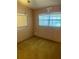 Cozy bedroom with carpet flooring and a window with natural light at 3005 W 18Th W Ave, Bradenton, FL 34205