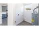 Clean and organized laundry area with modern appliances and ample storage at 3205 E North Bay St, Tampa, FL 33610