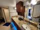 Bathroom featuring double vanity, granite counters, and updated lighting at 321 Parkside Ln, Safety Harbor, FL 34695