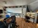 Upstairs loft featuring hardwood floors and natural lighting at 321 Parkside Ln, Safety Harbor, FL 34695