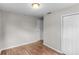 Bedroom featuring wood flooring and neutral walls at 3413 N 12Th St, Tampa, FL 33605