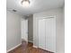An empty room with wood flooring and a closet at 3413 N 12Th St, Tampa, FL 33605
