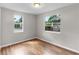 Bedroom featuring wood flooring and natural light at 3413 N 12Th St, Tampa, FL 33605