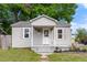 Charming single-story home features a covered front porch and a well-maintained lawn at 3413 N 12Th St, Tampa, FL 33605