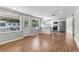 Open concept living space with wood flooring, abundant natural light and modern kitchen at 3413 N 12Th St, Tampa, FL 33605