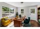 Home office with natural light, desk, and seating at 3413 N 12Th St, Tampa, FL 33605