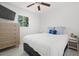 Bedroom featuring neutral furniture and a view from the window at 347 Patica Ne Rd, St Petersburg, FL 33702