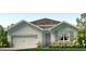 Charming one-story home with a two-car garage and stone accents at 3329 Ivy Hollow Dr, Plant City, FL 33565