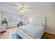 Cozy bedroom with natural light, wood floors, and neutral tones at 400 Westborough Ln, Safety Harbor, FL 34695