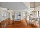 Bright foyer featuring gleaming hardwood floors, with views of dining and kitchen at 400 Westborough Ln, Safety Harbor, FL 34695