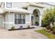 Charming home showcasing manicured landscaping and a welcoming entrance with beautiful decorations at 400 Westborough Ln, Safety Harbor, FL 34695