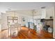 Spacious living room boasts hardwood floors, a fireplace, and ample natural light at 400 Westborough Ln, Safety Harbor, FL 34695
