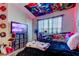 Unique bedroom decor featuring vibrant ceiling art and personalized touches creates an engaging, personal space at 4676 66Th N Pl, Pinellas Park, FL 33781