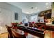 Cozy dining area with a classic table setting, elegant decor, and a view into the kitchen at 4676 66Th N Pl, Pinellas Park, FL 33781