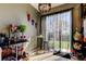 Eat-in kitchen provides sliding glass door access to a bright outdoor space, complemented by modern fixtures and cabinetry at 4676 66Th N Pl, Pinellas Park, FL 33781