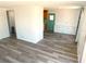 Spacious living room featuring laminate flooring at 5244 Betty St, Zephyrhills, FL 33542