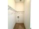 A walk-in closet with wire rack shelving and carpeted flooring at 5525 Thorngrove Way, Spring Hill, FL 34609