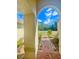 Welcoming entryway with brick path and decorative landscaping at 5525 Thorngrove Way, Spring Hill, FL 34609