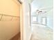 View of the walk-in closet from the living room at 5525 Thorngrove Way, Spring Hill, FL 34609