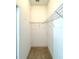 Walk-in closet with wire shelving offering ample storage space for clothes and accessories at 5525 Thorngrove Way, Spring Hill, FL 34609