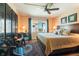 Comfortable bedroom with a large bed, stylish furniture, and plenty of natural light at 620 Edgewater Dr # 501, Dunedin, FL 34698