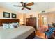 Comfortable bedroom with a king-size bed and an access to the bathroom at 620 Edgewater Dr # 501, Dunedin, FL 34698