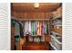 Walk-in cedar closet with built-in shelving, offering ample storage space at 620 Edgewater Dr # 501, Dunedin, FL 34698