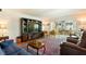 The living room offers ample natural light and a beautiful view of the outside world at 620 Edgewater Dr # 501, Dunedin, FL 34698