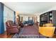 An open living space has been decorated with elegant touches, including a Persian rug and wood flooring at 620 Edgewater Dr # 501, Dunedin, FL 34698