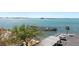 Scenic waterfront view with boat dock and parking area at 620 Edgewater Dr # 501, Dunedin, FL 34698