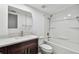 Bathroom showcasing a vanity with drawers, and shower over tub at 6343 92Nd N Pl # 2102, Pinellas Park, FL 33782