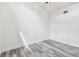 Cozy bedroom featuring gray wood-look flooring and a neutral color palette at 6343 92Nd N Pl # 2102, Pinellas Park, FL 33782